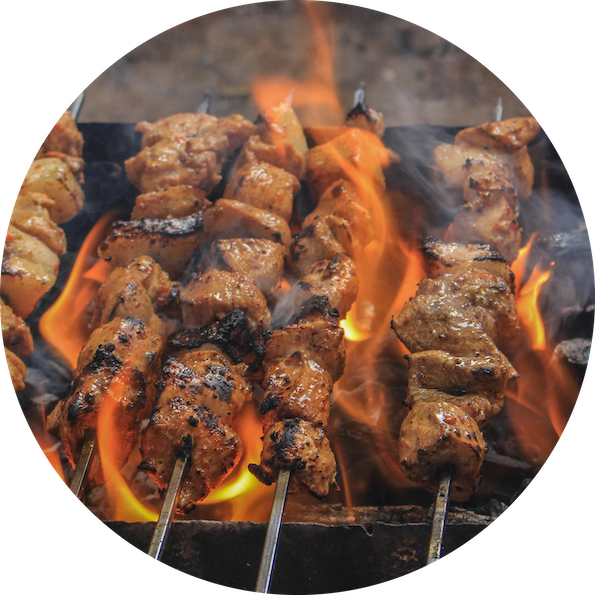 Chicken skewers being cooked on a the grill